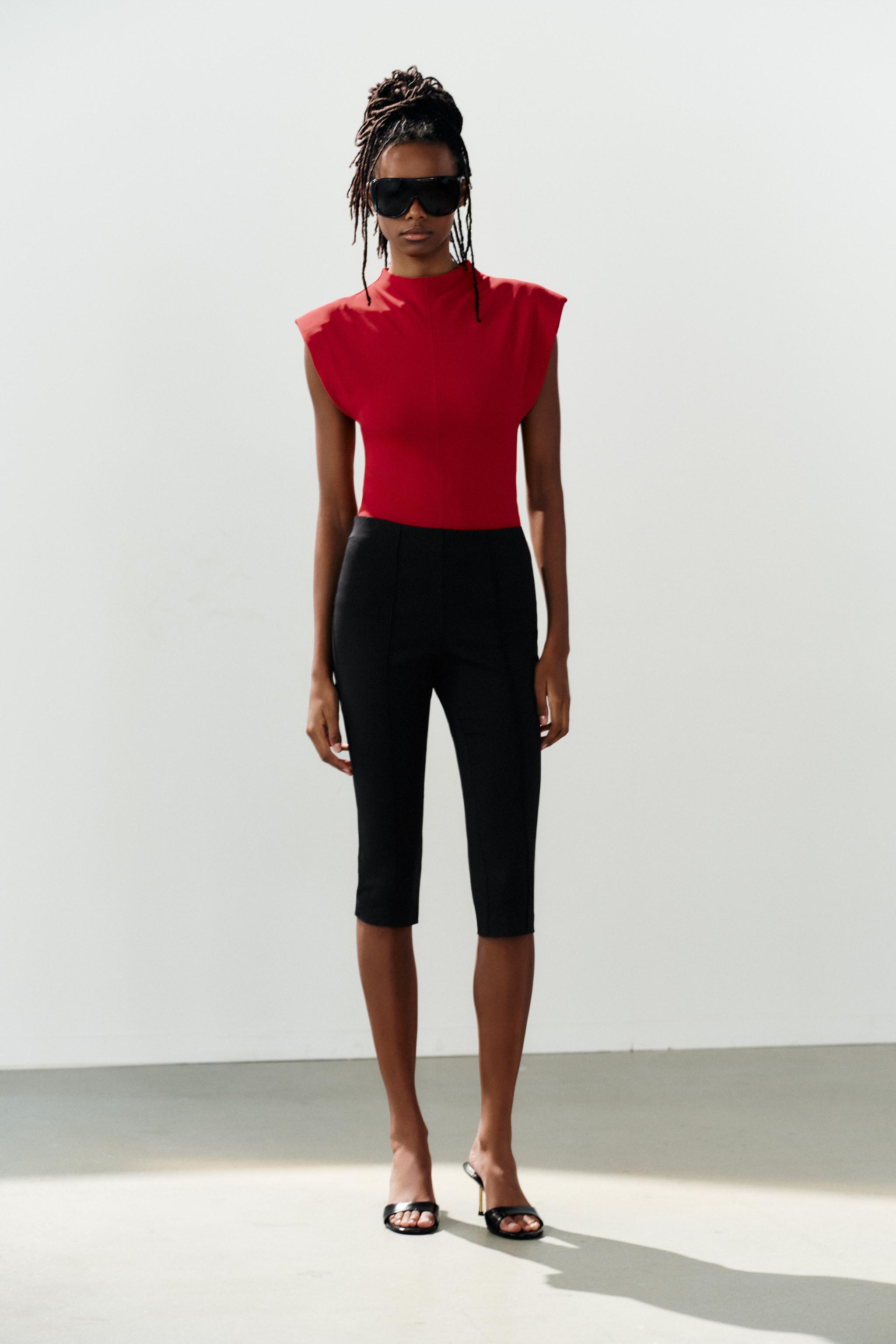 SHOULDER PAD BODYSUIT